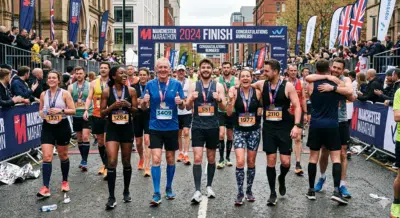 Runners wearing compression socks at a UK marathon finish line